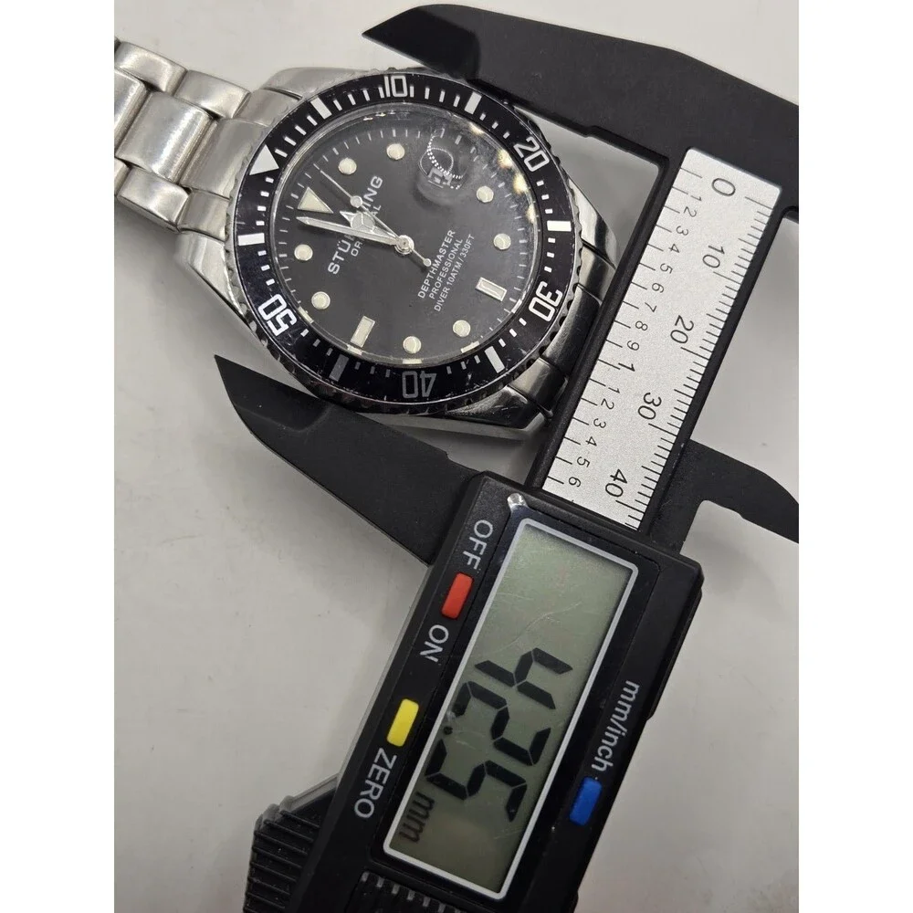 Stuhrling Original Depthmaster Quartz 43mm 100m Black Dial Date Watch. 7